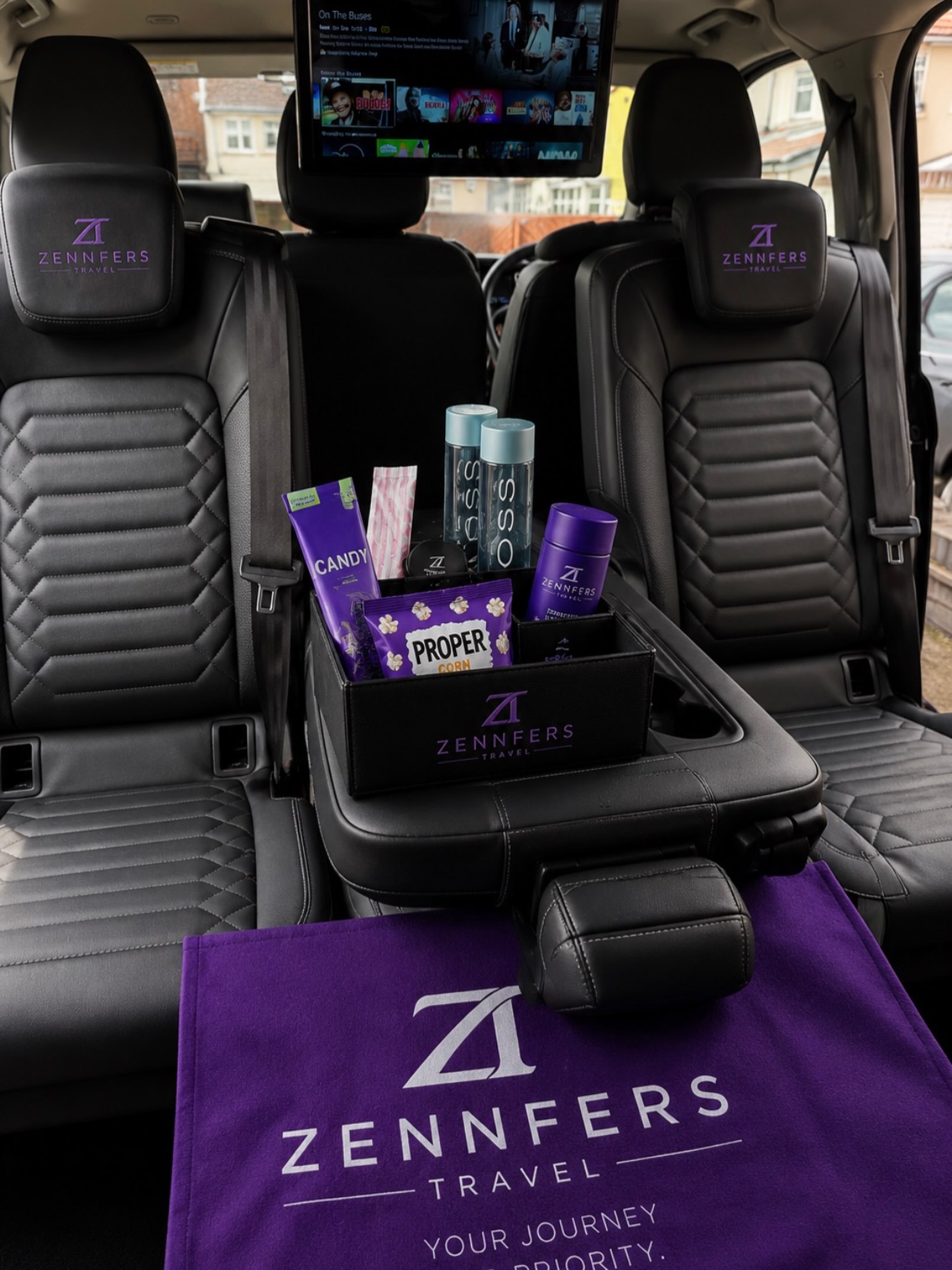 Non-alcoholic passenger welcome pack inside a Zennfers vehicle